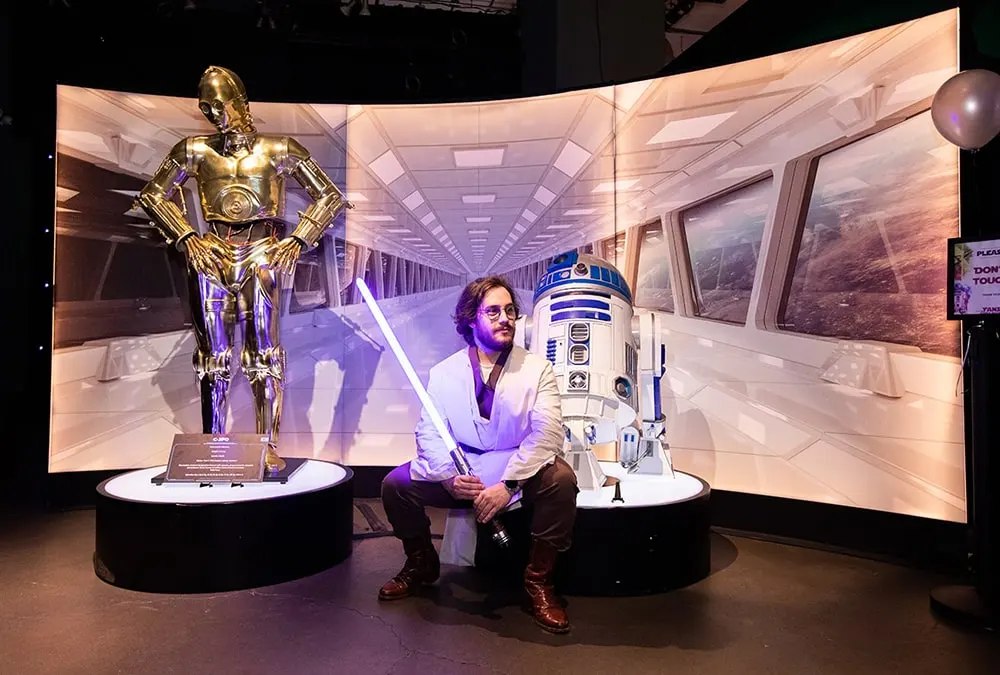 Figures and costumes at the Star Wars fan exhibit in New York
